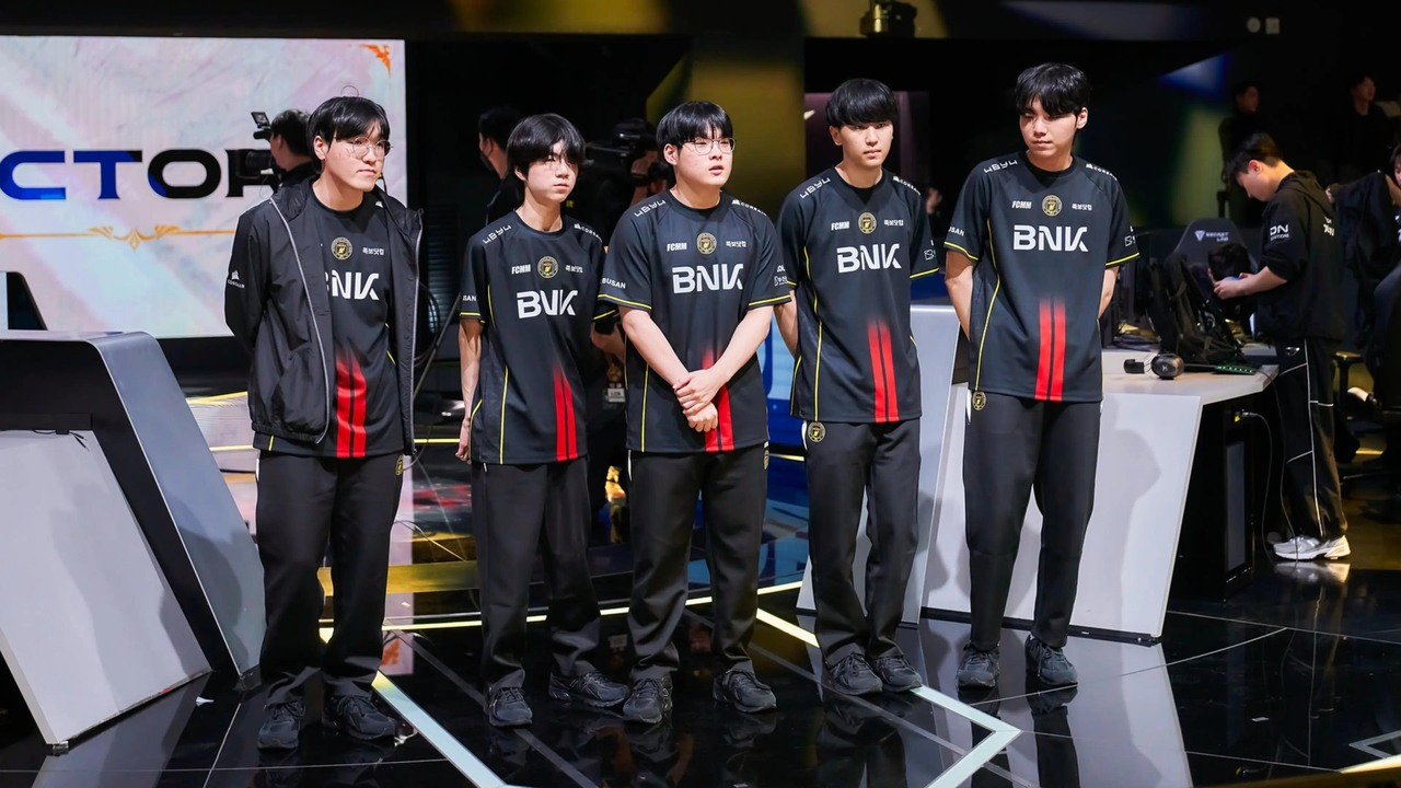 Five BNK FearX players stand together on the LCK tournament stage