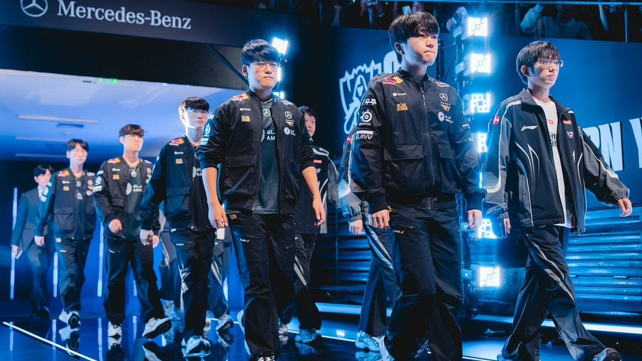 Anyone's Legend players walk onto a League of Legends stage